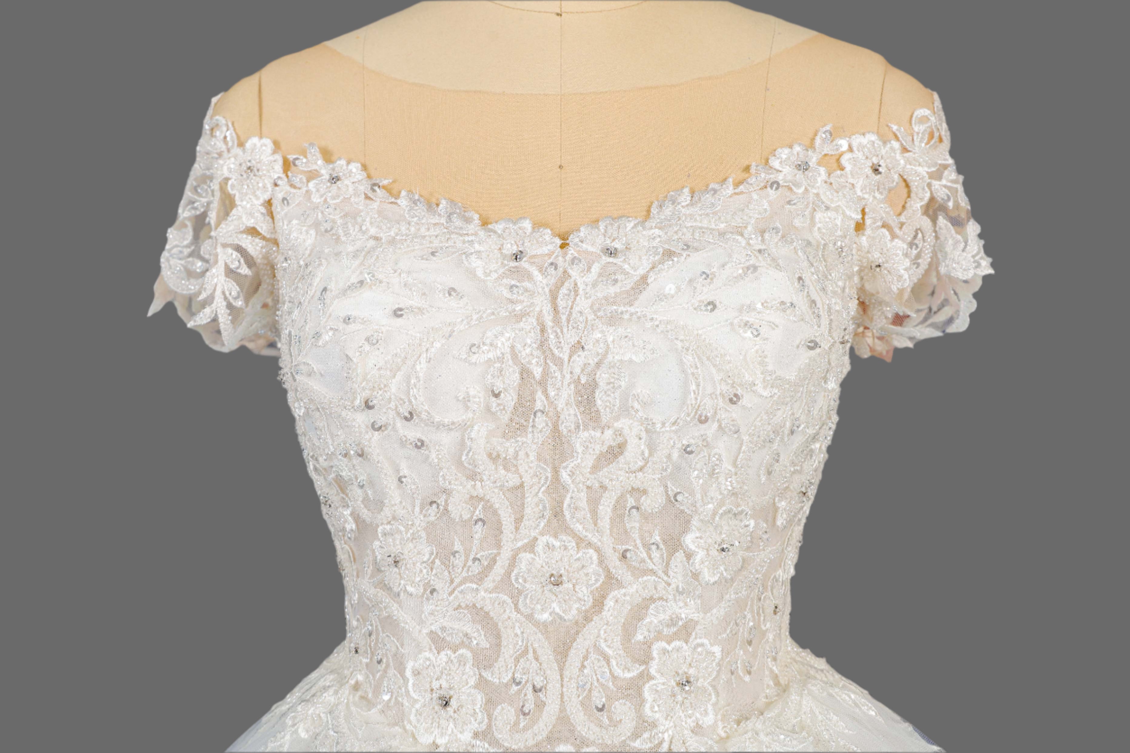 Enchanting Lace Ballgown Wedding Dress with Cathedral Train