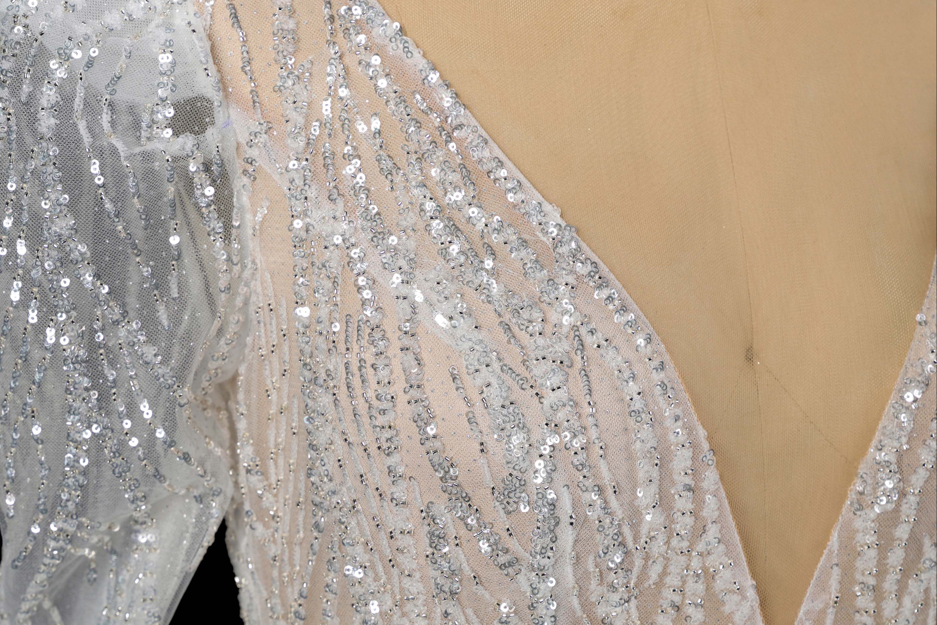 Illusion V-Neck Multi-Layer Beading Ball Gown Wedding Dress