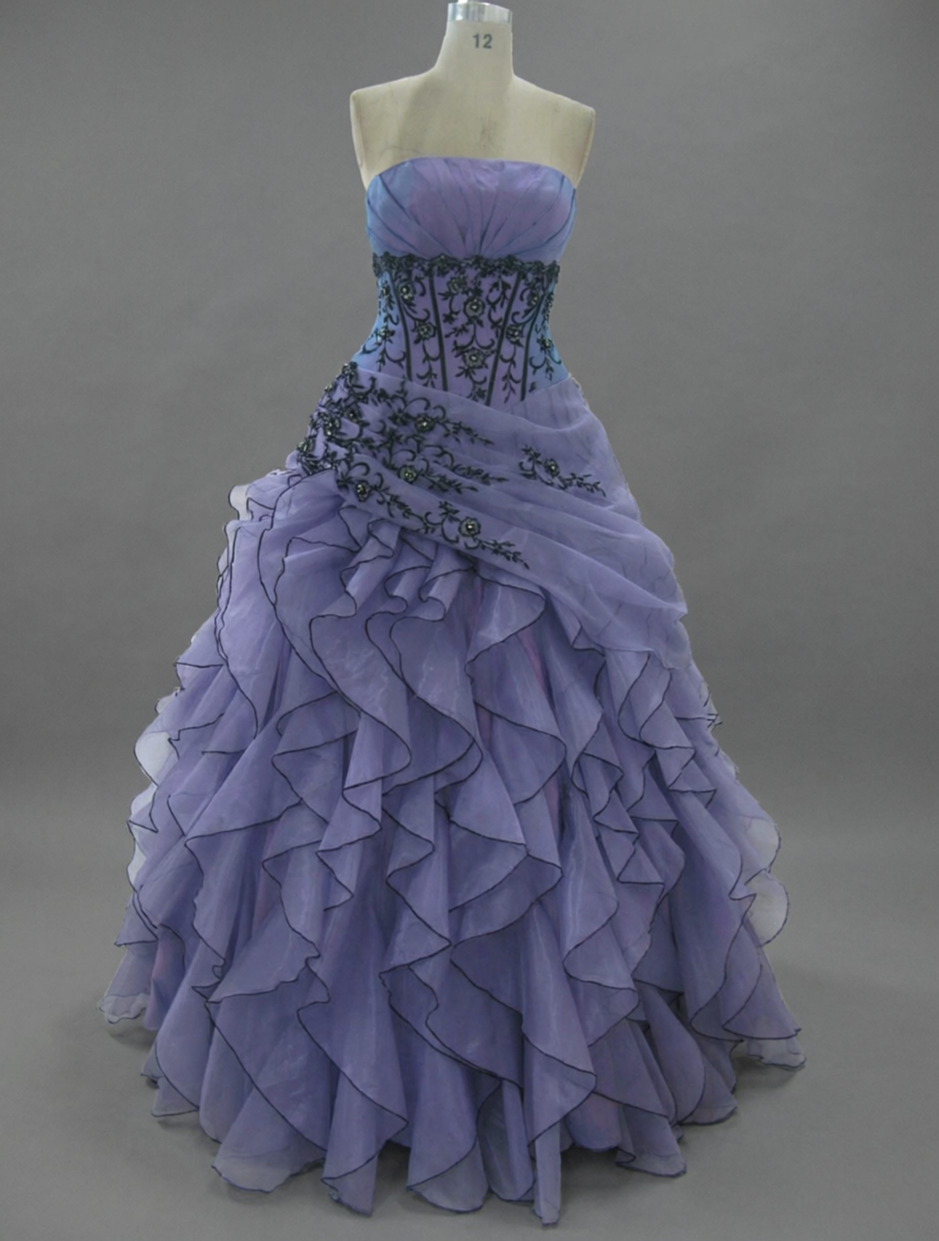 Lavender Purple Quinceanera Ball Gown with Black Floral Appliqué & Cascading Ruffle Organza Skirt