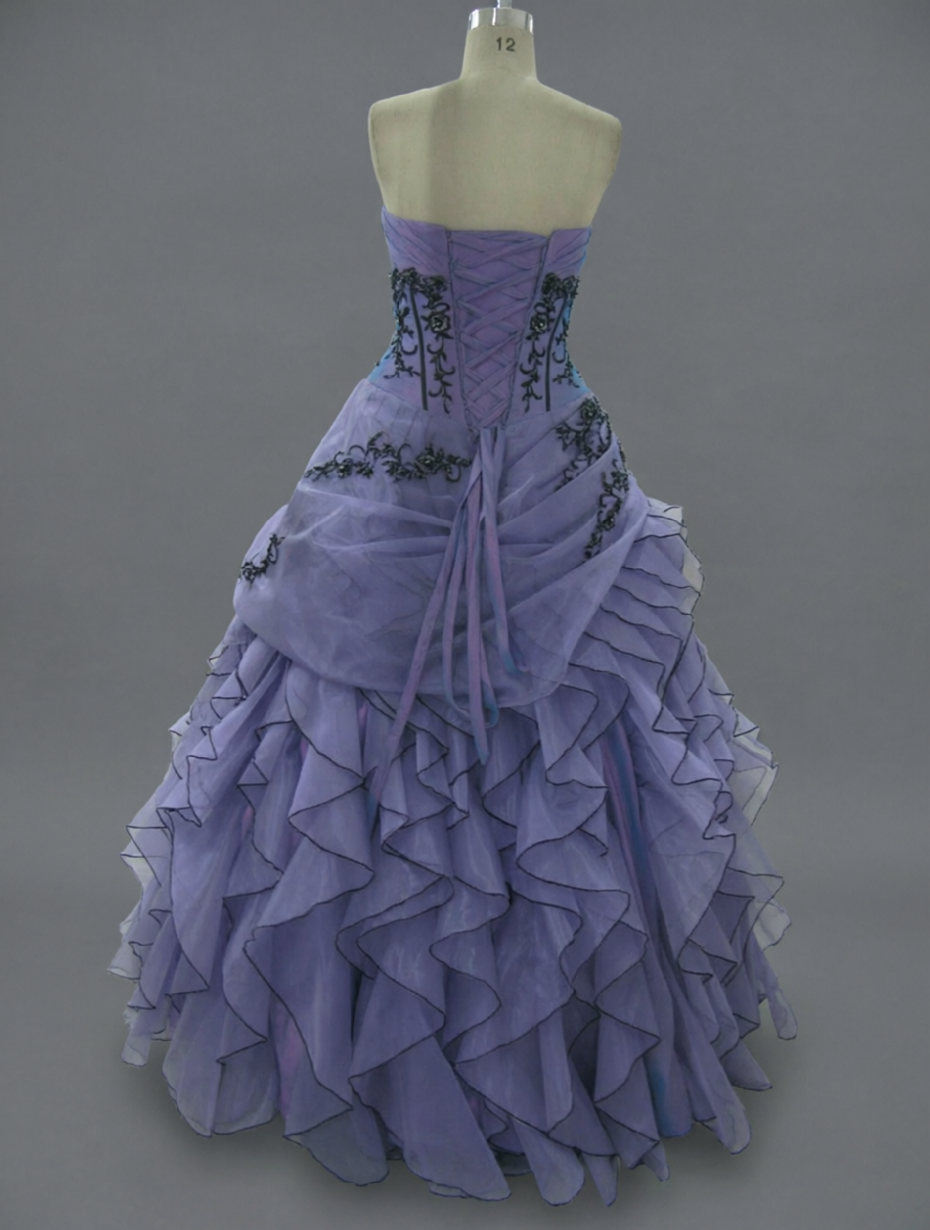 Lavender Purple Quinceanera Ball Gown with Black Floral Appliqué & Cascading Ruffle Organza Skirt