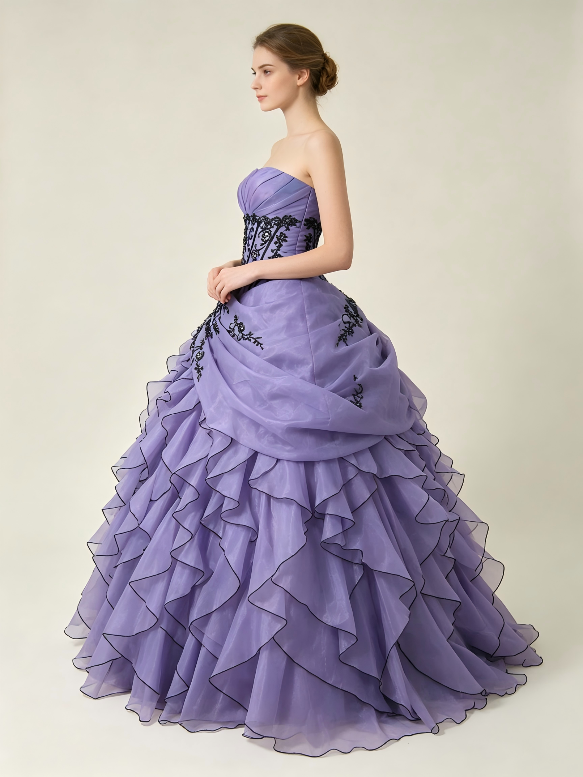 Lavender Purple Quinceanera Ball Gown with Black Floral Appliqué & Cascading Ruffle Organza Skirt